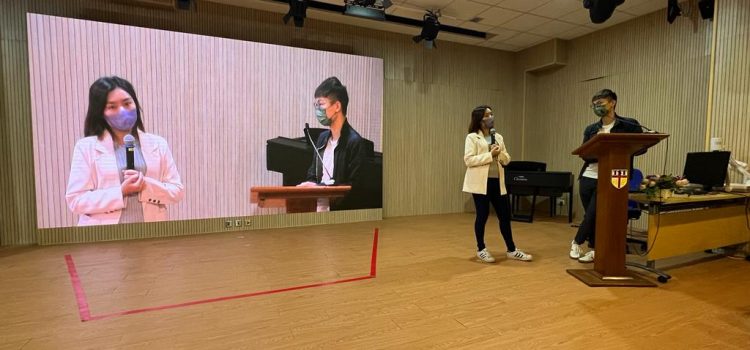 Alumni Ms YEUNG Man Ting Emily and Mr MA Hong Ki Ivan speaking at our whole-school assembly