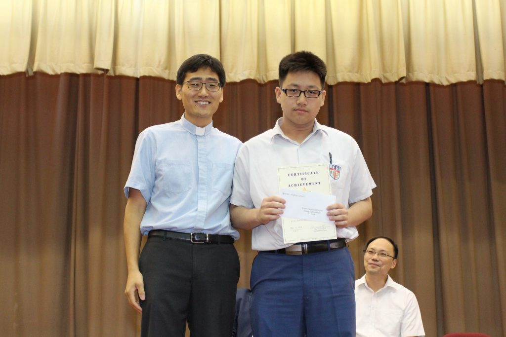 Rev Heewoo Han and the Third Prize winner (Senior Forms) 5E MA Kwok Kin